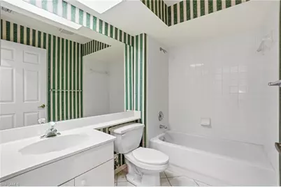 1032 Manor Lake Dr #D204, Naples, FL 34110 - Photo 15