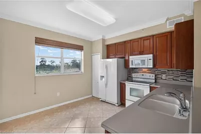 6816 Sterling Greens Pl #303, Naples, FL 34104 - Photo 3