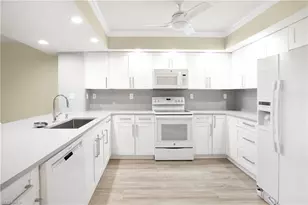 21 Bluebill Ave, Naples, FL 34108 - Photo 11