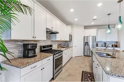 7611 Winding Cypress Dr, Naples, FL 34114 - Photo 7