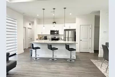 933 Oxford Ave S, Lehigh Acres, FL 33974 - Photo 5