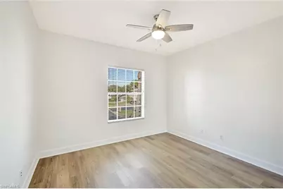 675 Wiggins Lake Dr #202, Naples, FL 34110 - Photo 13