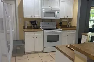 918 Margaret Ave S, Lehigh Acres, FL 33974 - Photo 9