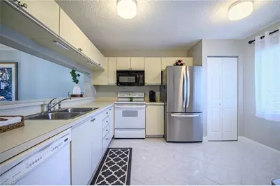 6945 Dennis Cir #I-107, Naples, FL 34104 - Photo 15