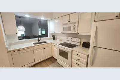 1025 Foxfire Ln #106, Naples, FL 34104 - Photo 9