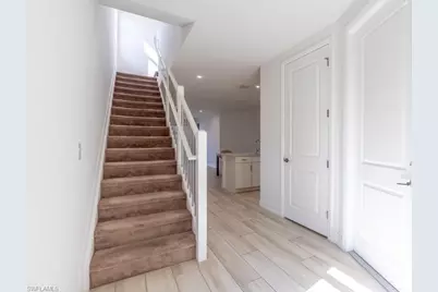 7565 Carnegie Way, Naples, FL 34119 - Photo 3