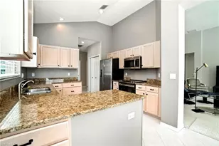 1842 Winding Oaks Way, Naples, FL 34109 - Photo 27