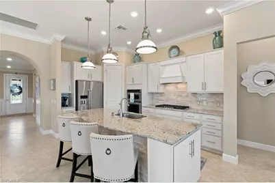 7679 Winding Cypress Dr, Naples, FL 34114 - Photo 9