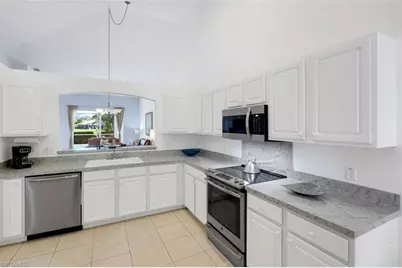 7755 Berkshire Pines Dr, Naples, FL 34104 - Photo 13