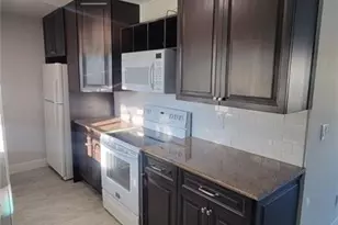 909 Sally Ave N, Lehigh Acres, FL 33971 - Photo 3