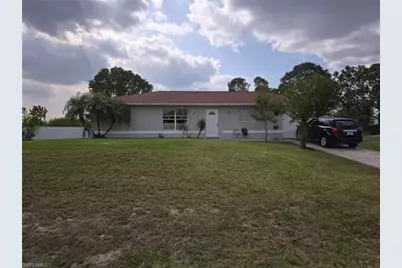 909 Sally Ave N, Lehigh Acres, FL 33971 - Photo 1