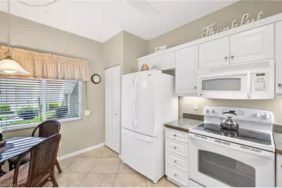 700 Saratoga Cir #B106, Naples, FL 34104 - Photo 9