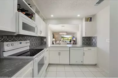 1250 Yesica Ann Cir #E201, Naples, FL 34110 - Photo 7