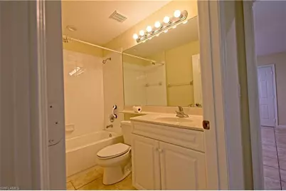 25064 Peacock Ln #102, Naples, FL 34114 - Photo 11