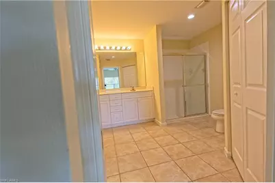 25064 Peacock Ln #102, Naples, FL 34114 - Photo 15