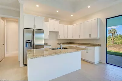 873 18th St NE, Naples, FL 34120 - Photo 5