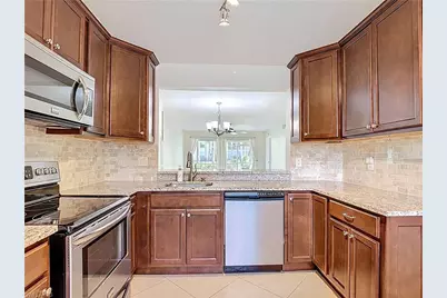 729 Landover Ct #102, Naples, FL 34104 - Photo 1