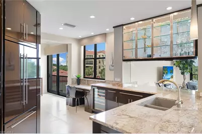 7008 Pelican Bay Blvd #H304, Naples, FL 34108 - Photo 15