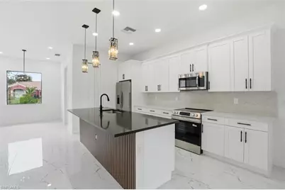 2930 20th St SW, Lehigh Acres, FL 33976 - Photo 9