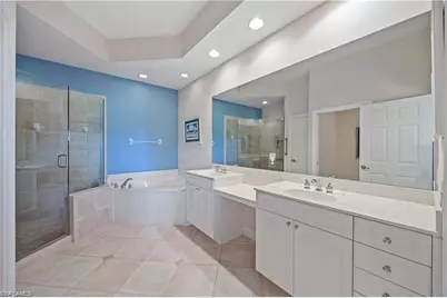 9069 Whimbrel Watch Ln #102, Naples, FL 34109 - Photo 17