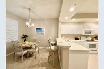 3455 Laurel Greens Ln S #103, Naples, FL 34119 - Photo 7