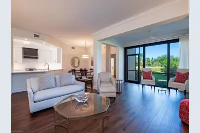 7048 Pelican Bay Blvd #C101, Naples, FL 34108 - Photo 1