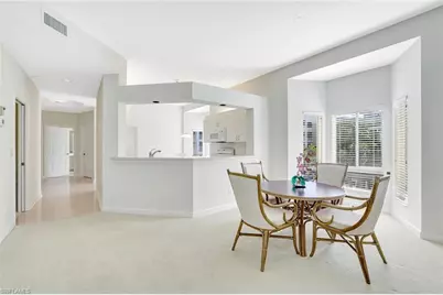 7654 Pebble Creek Cir #5-301, Naples, FL 34108 - Photo 11