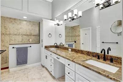 11596 Quail Village Way, Naples, FL 34119 - Photo 15