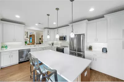 11426 Quail Village Way, Naples, FL 34119 - Photo 9