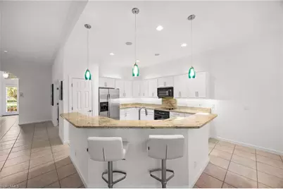 15818 Delaplata Ln, Naples, FL 34110 - Photo 9