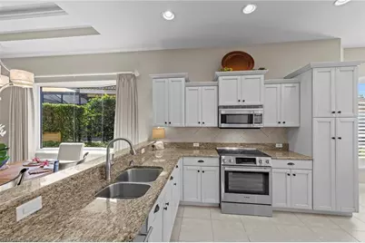 9230 Troon Lakes Dr, Naples, FL 34109 - Photo 9