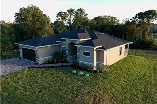 810 Sentinela Blvd, Lehigh Acres, FL 33974 - Photo 1