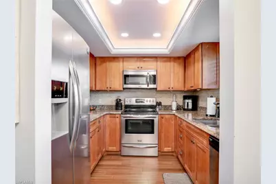 5483 Rattlesnake Hammock Rd #B103, Naples, FL 34113 - Photo 7