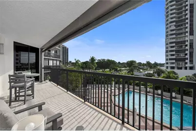 6075 Pelican Bay Blvd #303, Naples, FL 34108 - Photo 1