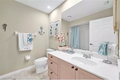 2476 Orchid Bay Dr #W201, Naples, FL 34109 - Photo 19