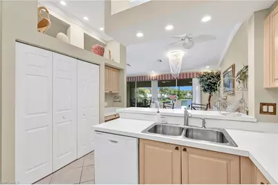 2476 Orchid Bay Dr #W201, Naples, FL 34109 - Photo 11