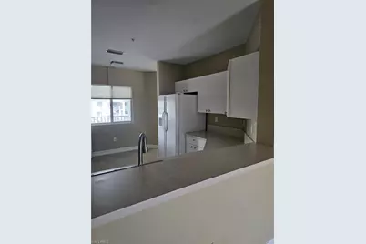 7835 Regal Heron Cir #301, Naples, FL 34104 - Photo 1