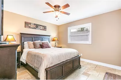 401 Candlewick Cir E, Lehigh Acres, FL 33936 - Photo 19