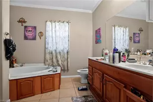 2808 34th St SW, Lehigh Acres, FL 33976 - Photo 13