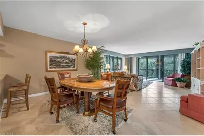 6040 Pelican Bay Blvd #D-105, Naples, FL 34108 - Photo 5