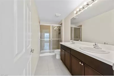 15484 Wildflower Cir, Naples, FL 34119 - Photo 13