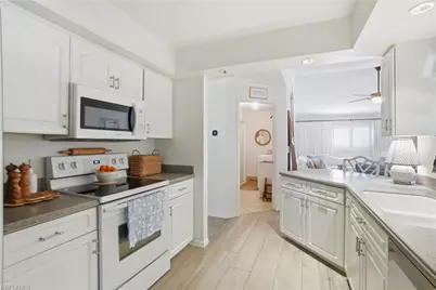 2644 River Reach Dr, Naples, FL 34104 - Photo 19