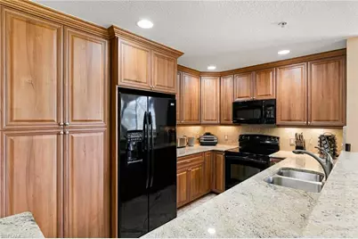 6820 Sterling Greens Pl #2101, Naples, FL 34104 - Photo 9