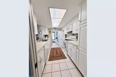 15 Bluebill Ave #206, Naples, FL 34108 - Photo 5