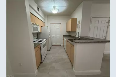 1210 Reserve Way #9-107, Naples, FL 34105 - Photo 7