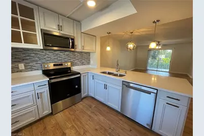 2395 Naples Trace Cir #6, Naples, FL 34109 - Photo 5