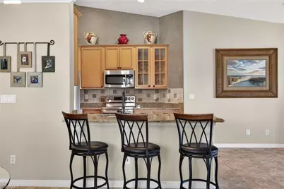 6846 Sterling Greens Dr #104, Naples, FL 34104 - Photo 9