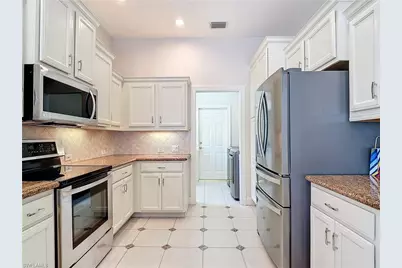 9190 Troon Lakes Dr, Naples, FL 34109 - Photo 17