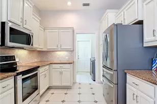 9190 Troon Lakes Dr, Naples, FL 34109 - Photo 17