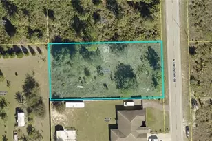 909 Richmond Ave N, Lehigh Acres, FL 33972 - Photo 1